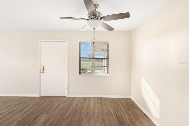 96 Boundary Blvd Unit 112, Rotonda West, FL 33947 - empty room with wood finished floors, ceiling fan, and baseboards