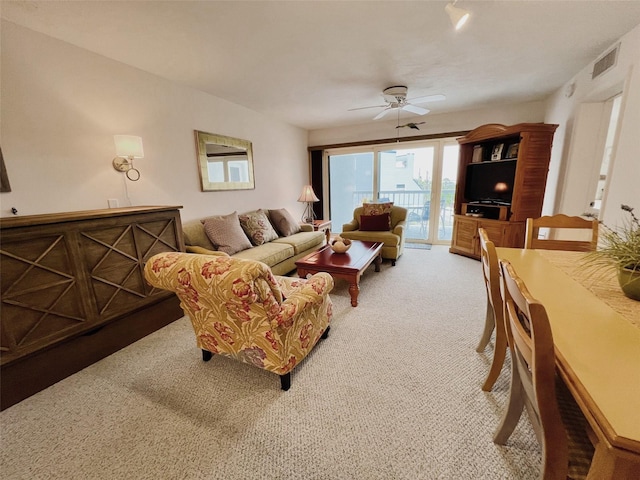 2380 N Beach Rd Unit 210, Englewood, FL 34223 - living room with carpet floors and ceiling fan