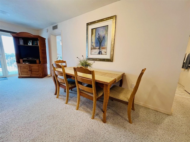 2380 N Beach Rd Unit 210, Englewood, FL 34223 - dining room featuring carpet flooring