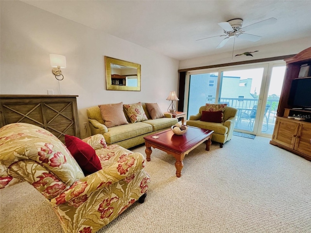 2380 N Beach Rd Unit 210, Englewood, FL 34223 - carpeted living area with a ceiling fan