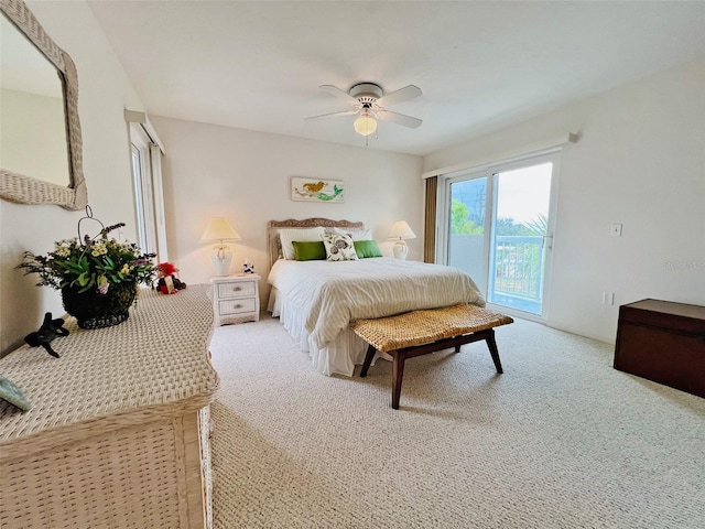 2380 N Beach Rd Unit 210, Englewood, FL 34223 - carpeted bedroom featuring access to exterior and a ceiling fan