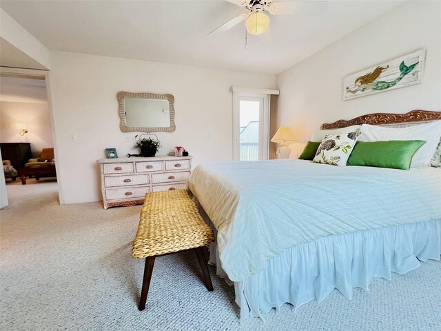 2380 N Beach Rd Unit 210, Englewood, FL 34223 - bedroom with light carpet and ceiling fan