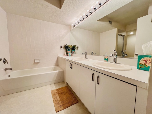2380 N Beach Rd Unit 210, Englewood, FL 34223 - bathroom with a bath, a shower, double vanity, and tile patterned floors