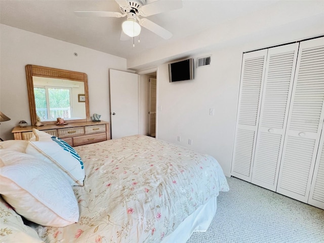 2380 N Beach Rd Unit 210, Englewood, FL 34223 - bedroom featuring a closet, light colored carpet, and a ceiling fan