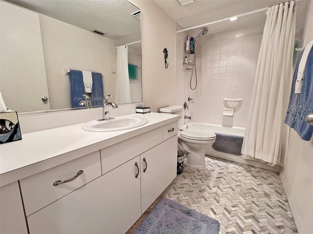 2380 N Beach Rd Unit 210, Englewood, FL 34223 - full bathroom featuring vanity, shower / bath combo with shower curtain, and toilet