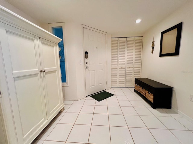 2380 N Beach Rd Unit 210, Englewood, FL 34223 - entrance foyer featuring recessed lighting, light tile patterned flooring, and baseboards