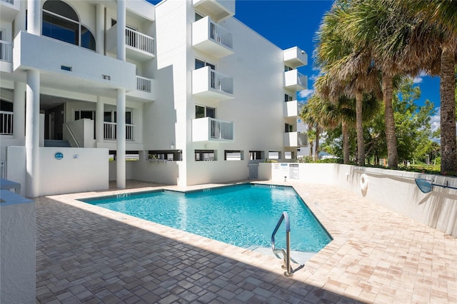 2380 N Beach Rd Unit 210, Englewood, FL 34223 - community pool featuring a patio area
