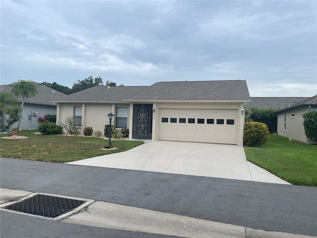 534 Wekiva River Ct Unit 103, Englewood, FL 34223 - single story home with concrete driveway, an attached garage, a front yard, and stucco siding