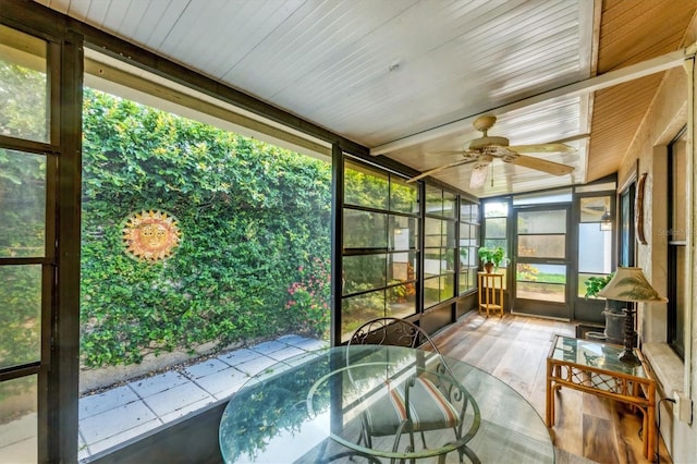 534 Wekiva River Ct Unit 103, Englewood, FL 34223 - sunroom / solarium with a ceiling fan and outdoor dining space