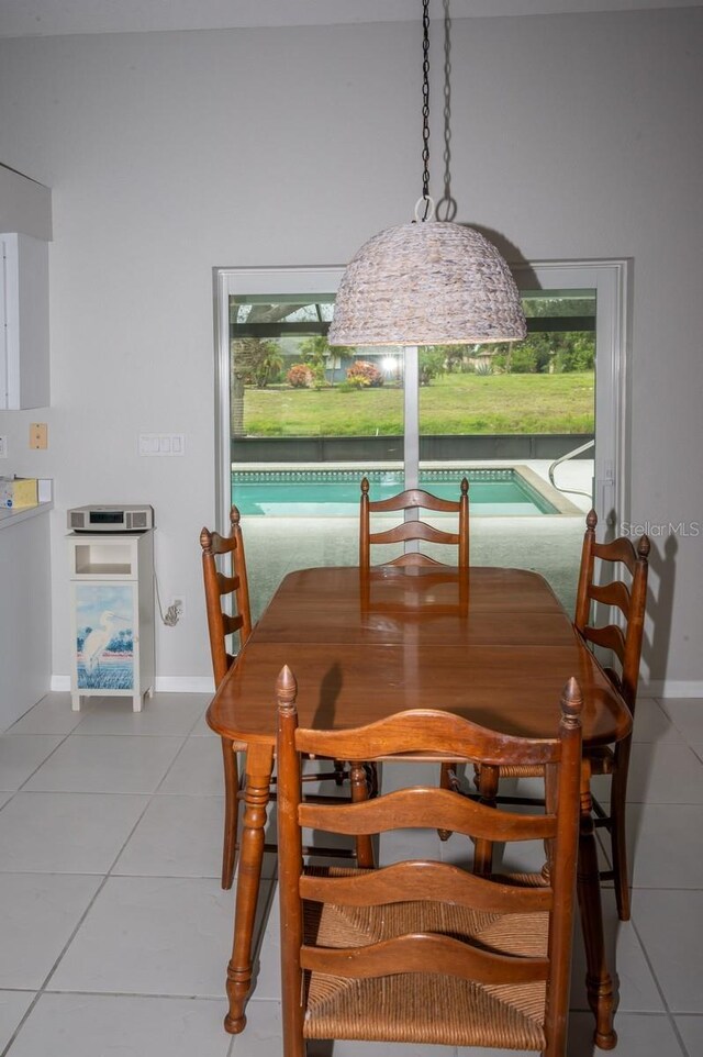 21 Sportsman Way, Rotonda West, FL 33947 - tiled dining room with baseboards