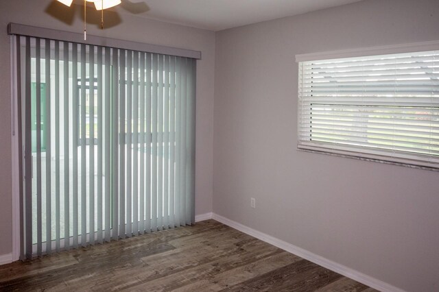 21 Sportsman Way, Rotonda West, FL 33947 - spare room with wood finished floors, a ceiling fan, and baseboards