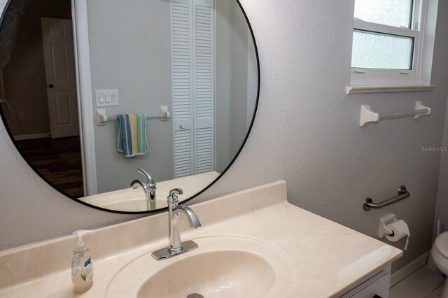 21 Sportsman Way, Rotonda West, FL 33947 - bathroom with a closet, vanity, and toilet