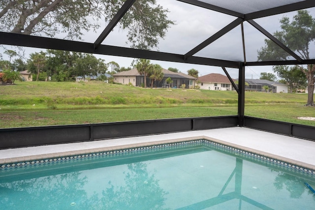 21 Sportsman Way, Rotonda West, FL 33947 - outdoor pool with a lawn, a lanai, a residential view, and a patio