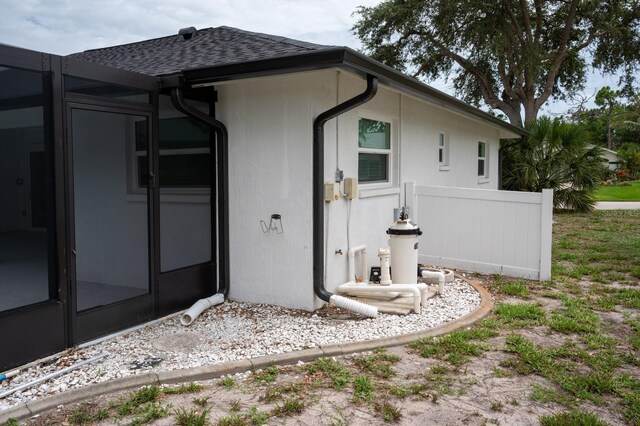 21 Sportsman Way, Rotonda West, FL 33947 - rear view of property with a shingled roof