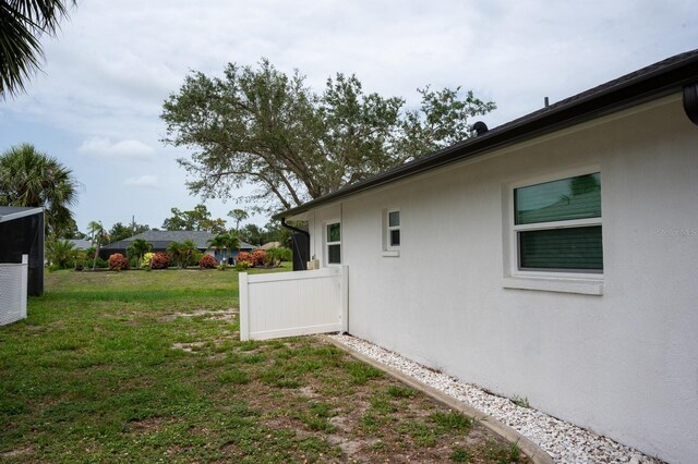 21 Sportsman Way, Rotonda West, FL 33947 - view of grassy yard
