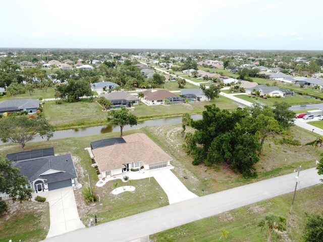 21 Sportsman Way, Rotonda West, FL 33947 - aerial view of property's location featuring a large body of water and nearby suburban area