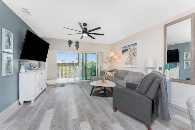 8405 Placida Rd Unit 406, Placida, FL 33946 - living area featuring a ceiling fan and light wood-style floors