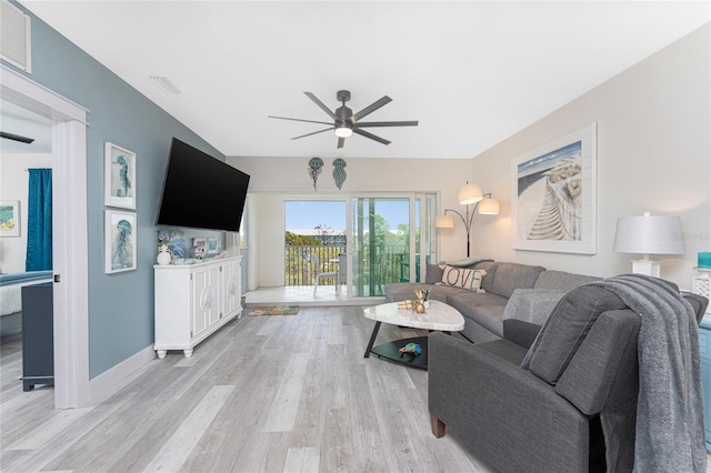 8405 Placida Rd Unit 406, Placida, FL 33946 - living area with a ceiling fan, light wood-type flooring, and baseboards