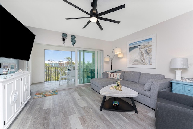 8405 Placida Rd Unit 406, Placida, FL 33946 - living room with a ceiling fan and light wood finished floors