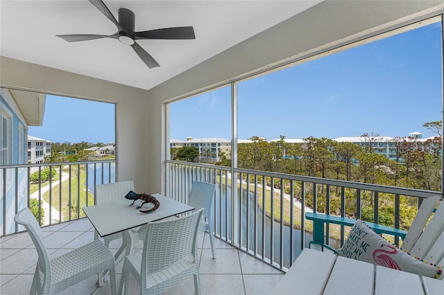 8405 Placida Rd Unit 406, Placida, FL 33946 - balcony featuring ceiling fan and outdoor dining space