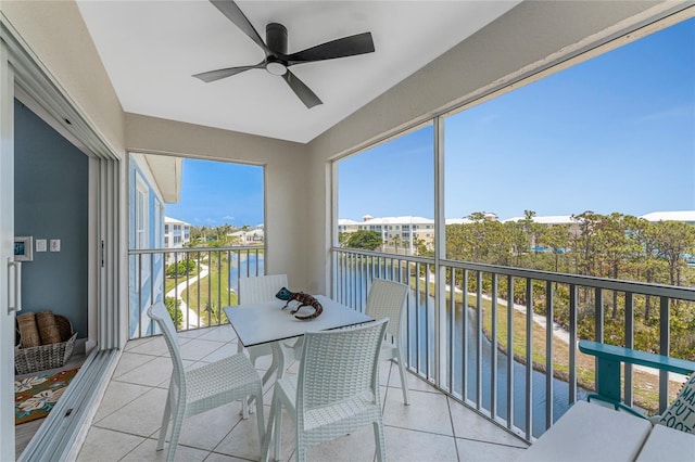8405 Placida Rd Unit 406, Placida, FL 33946 - balcony featuring a ceiling fan and a water view