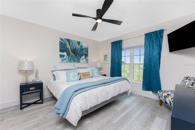 8405 Placida Rd Unit 406, Placida, FL 33946 - bedroom with light wood-style flooring, baseboards, and ceiling fan