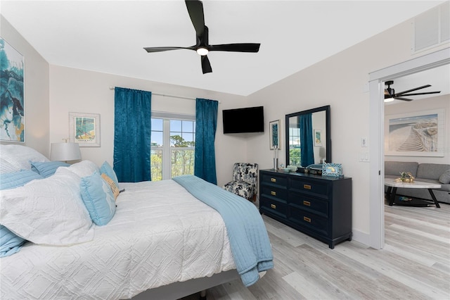 8405 Placida Rd Unit 406, Placida, FL 33946 - bedroom with light wood-style flooring and a ceiling fan