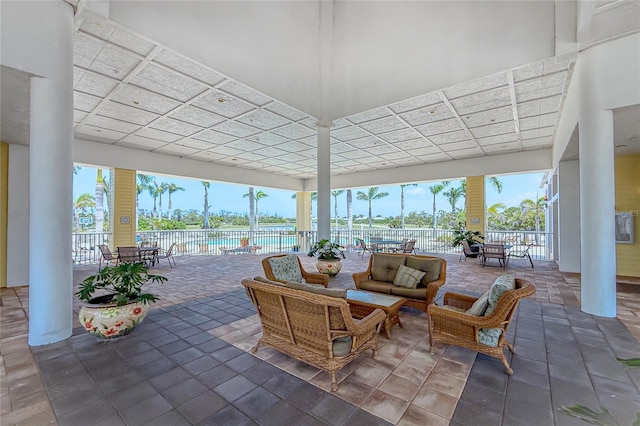 8405 Placida Rd Unit 406, Placida, FL 33946 - view of patio / terrace with an outdoor living space, a water view, and outdoor dining area