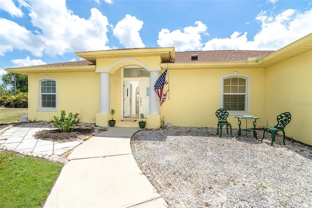 6158 Cavan St, Englewood, FL 34224 - property entrance featuring stucco siding