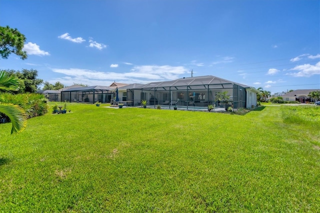 423 Boundary Blvd, Rotonda West, FL 33947 - view of green lawn with a lanai