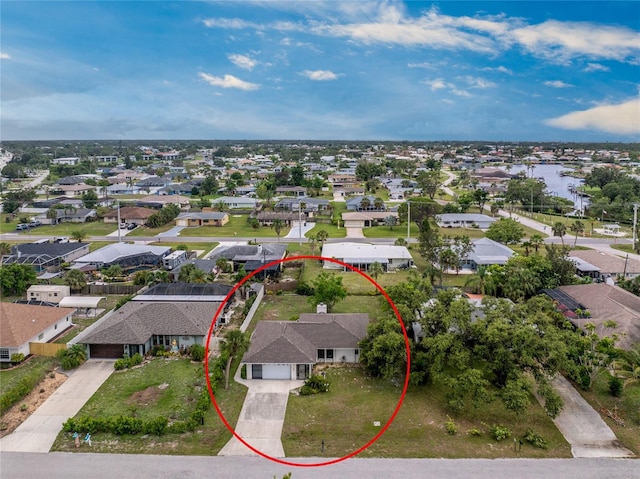 1337 Le Pera Rd, Englewood, FL 34223 - aerial perspective of suburban area with a nearby body of water