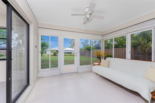 1337 Le Pera Rd, Englewood, FL 34223 - sunroom / solarium with ceiling fan and outdoor lounge area