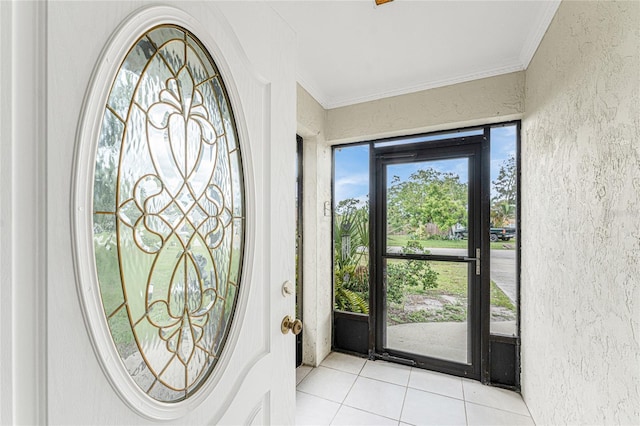 1337 Le Pera Rd, Englewood, FL 34223 - entryway with a textured wall, crown molding, and tile patterned floors