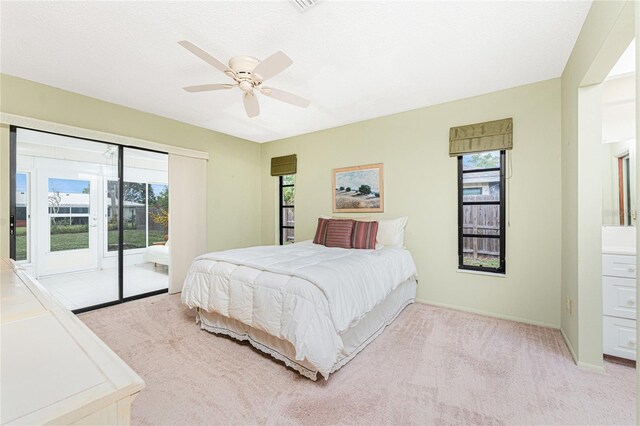 1337 Le Pera Rd, Englewood, FL 34223 - bedroom featuring access to exterior, carpet, baseboards, and a ceiling fan