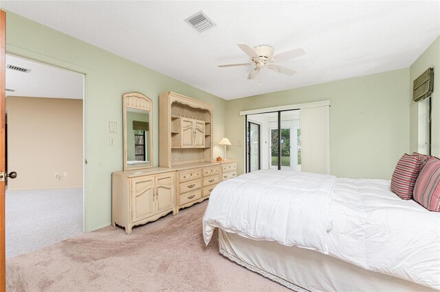 1337 Le Pera Rd, Englewood, FL 34223 - bedroom with light colored carpet and a ceiling fan