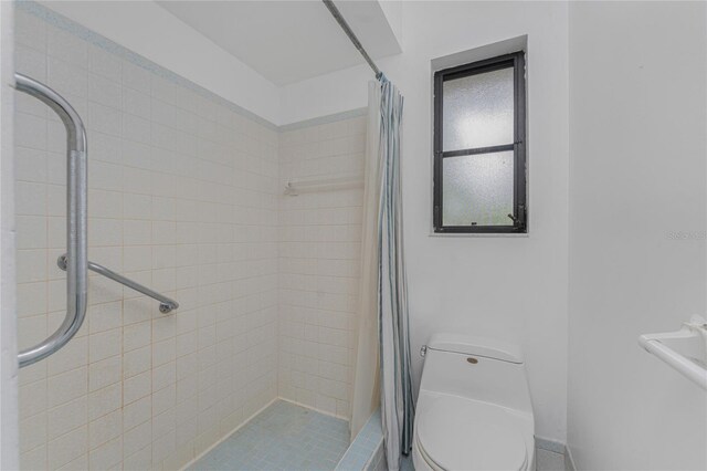1337 Le Pera Rd, Englewood, FL 34223 - full bath featuring tiled shower and toilet