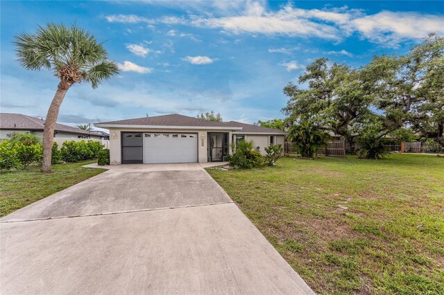 1337 Le Pera Rd, Englewood, FL 34223 - ranch-style home with an attached garage, concrete driveway, and stucco siding