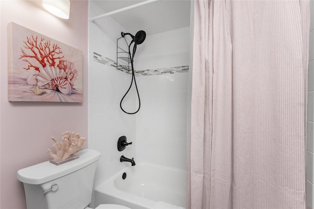 1591 Beach Rd Unit 402, Englewood, FL 34223 - bathroom with shower / bathtub combination with curtain and toilet