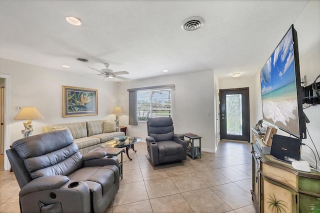 1040 Caples St, Englewood, FL 34223 - living room with light tile patterned floors, ceiling fan, and recessed lighting