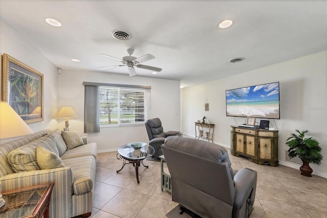 1040 Caples St, Englewood, FL 34223 - living room with light tile patterned flooring, baseboards, ceiling fan, and recessed lighting