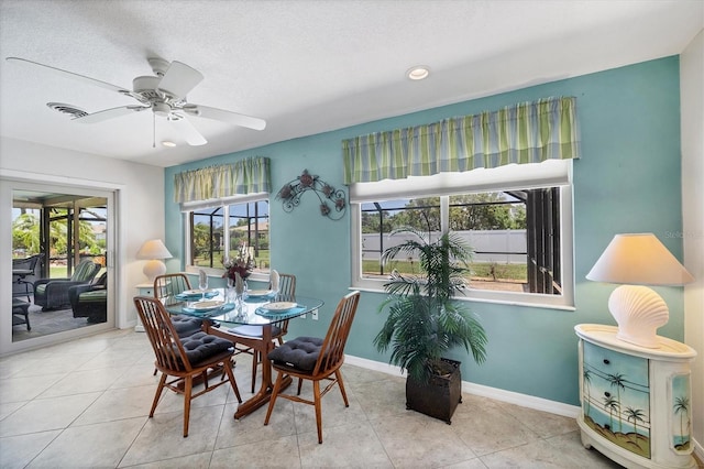 1040 Caples St, Englewood, FL 34223 - tiled dining room featuring a ceiling fan, baseboards, and recessed lighting