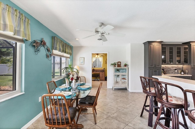 1040 Caples St, Englewood, FL 34223 - dining room with light tile patterned floors, ceiling fan, baseboards, and recessed lighting