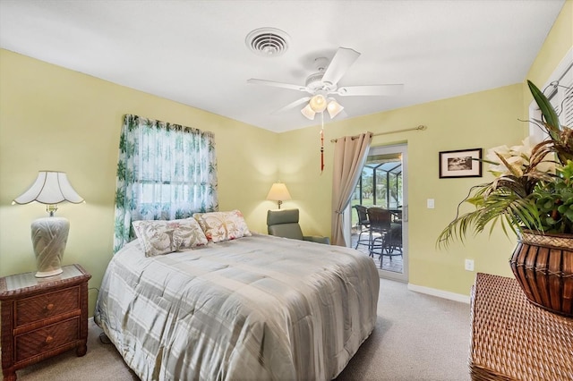 1040 Caples St, Englewood, FL 34223 - bedroom featuring access to exterior, carpet floors, baseboards, and a ceiling fan