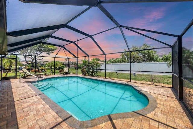 1040 Caples St, Englewood, FL 34223 - view of swimming pool featuring a patio area and glass enclosure