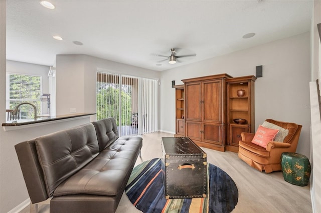 8228 Villa Grande Ct, Sarasota, FL 34243 - living area featuring a ceiling fan, light wood-style floors, baseboards, and recessed lighting