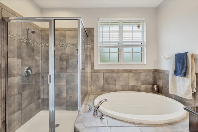 8228 Villa Grande Ct, Sarasota, FL 34243 - bathroom featuring a bath and a stall shower