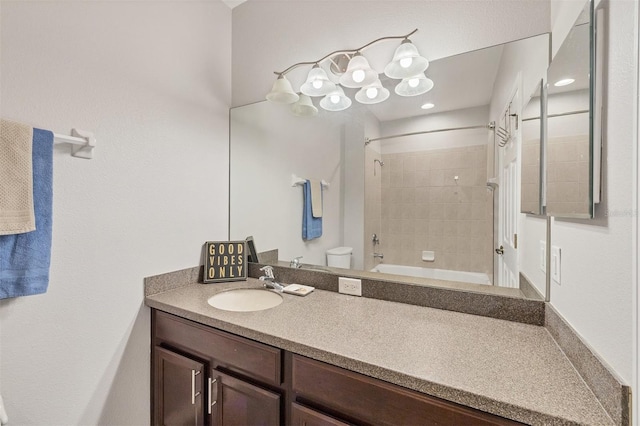8228 Villa Grande Ct, Sarasota, FL 34243 - full bathroom with vanity, toilet, and shower / tub combination