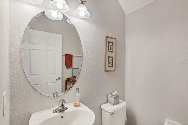 8228 Villa Grande Ct, Sarasota, FL 34243 - half bathroom with a sink and toilet