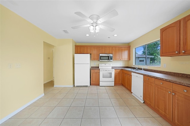 4371 Tollefson Ave, North Port, FL 34287 - kitchen featuring white appliances, a sink, dark countertops, recessed lighting, and a ceiling fan