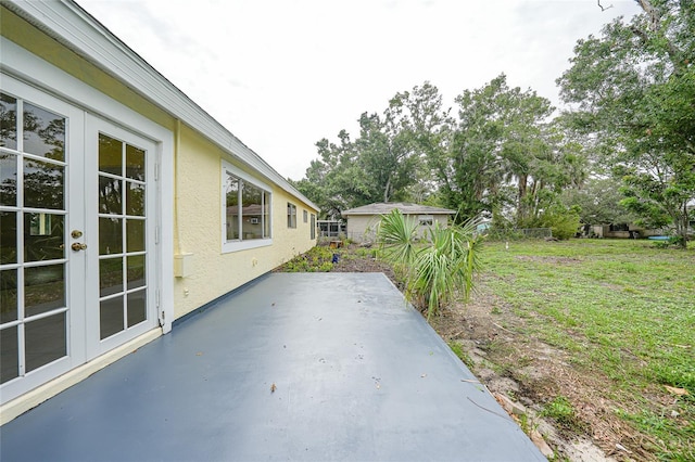 4371 Tollefson Ave, North Port, FL 34287 - view of patio / terrace with french doors